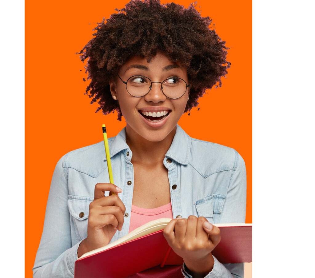 Joyful black author works on writing new book for readers, has positive expression, inspiration to work and create, carries notepad and pencil, isolated over pink background with free space for text